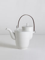 Bauhaus-style teapot with iron handle