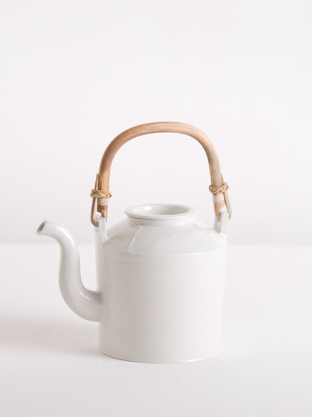 teapot with moulded shoulder portion and cane handle