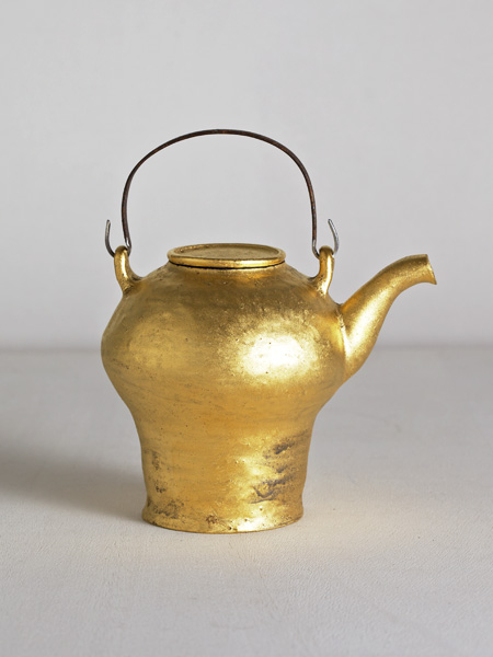 gold teapot